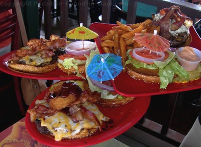 Picture of juicy cheeseburgers at the Cheeseburger in Paradise, Maui restaurant located in the town of Lahaina.