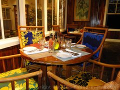 Picture of seating near the kitchen of the Hula Grill Maui in Whaler's Village.