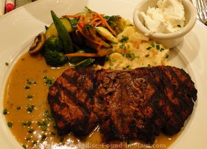 Picture of filet special with sake cream sauce and mashed potatoes with applewood smoked bacon and goat cheese at the Hula Grill Maui in Whaler's Village.