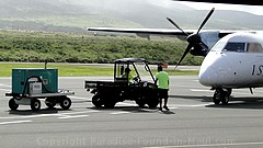 Picture of an airplane on the runway at the West Maui Kapalua Airport on the island of Maui, Hawaii.