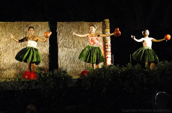 Trio of female hula dancers at Maui's Sheraton Luau