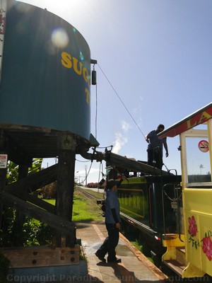 Picture of the Sugar Cane Train getting a refill of water at Kaanapali Station, Maui, Hawaii.