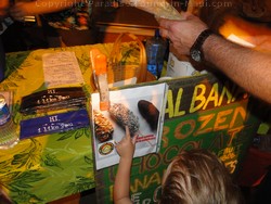 Picture of frozen chocolate bananas for sale at Wailuku First Friday.