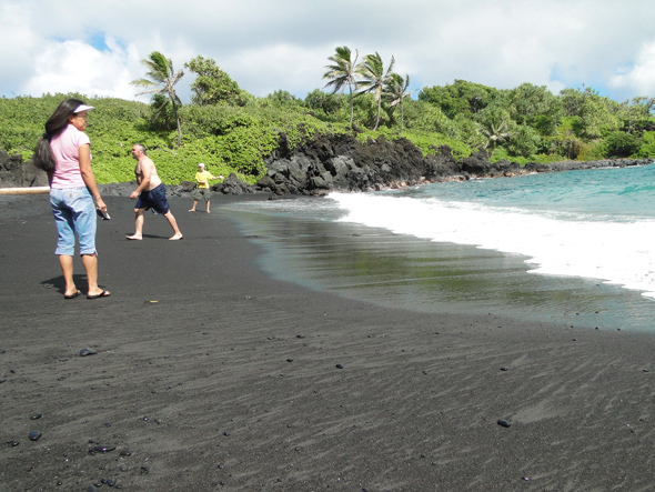 sand and surf at black sand beach on Maui