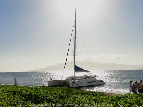 Picture of the Teralani catamaran on Kaanapali Beach.