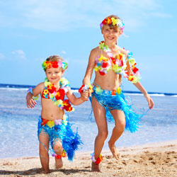 kids dressed up in hula attire for a luau