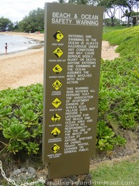 Picture of warning sign at Ulua Beach, Maui, Hawaii.