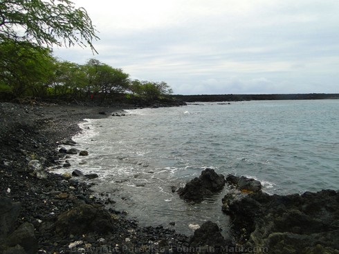Picture of black rock beach at The Dumps in the Ahihi Kinau Natural Area Reserve, Maui, Hawaii.