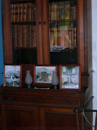 Picture of the bookcase in the Baldwin Home Museum on Front Street, Lahaina on the island of Maui, Hawaii.