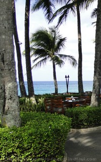 Picture of an outdoor ocean view dining table at the Ritz Carlton Kapalua Maui.