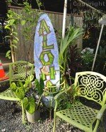 picture of aloha surfboard at Nahiku marketplace along the road to Hana on the island of Maui, Hawaii.