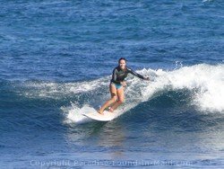 female surfer hookipa