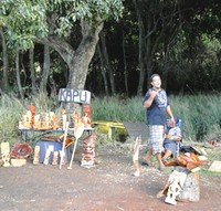 Picture of tikis and masks for sale along the highway in Maui, Hawaii.