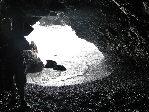 Sea cave at Waianapanapa black sand beach on maui