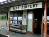 Picture of the Hana Airport Terminal and Welcome Sign in Maui, Hawaii.