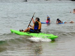 Picture of someone on an ocean kayak at Ulua Beach, Wailea, Maui, Hawaii.